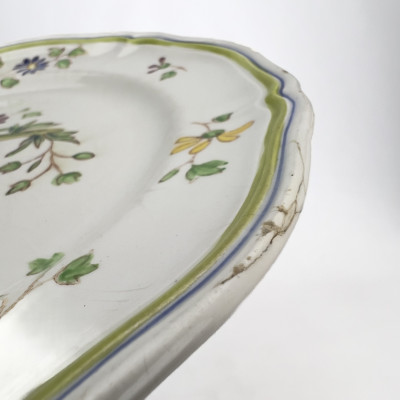 A French Moustiers Faience Partially Assembled Dinner Service (50+ Pieces)