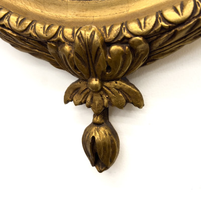 A Neoclassical Style Giltwood and Gesso Wall Mirror