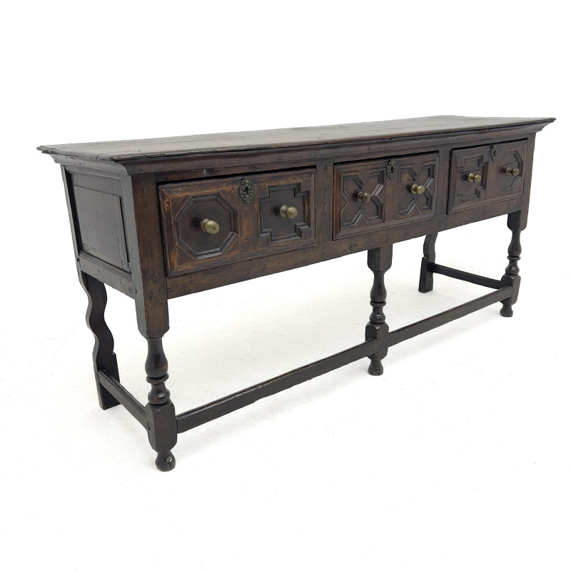 An Antique Jacobean Style Molded Oak Dresser Base