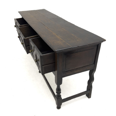 An Antique Jacobean Style Molded Oak Dresser Base