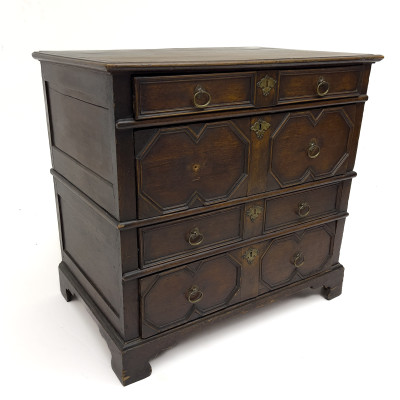 An Antique Jacobean Geometric Molded Oak Chest of Drawers