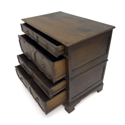 An Antique Jacobean Geometric Molded Oak Chest of Drawers