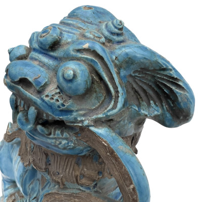 A Pair of Chinese Glazed Turquoise Ceramic Guardian Lions