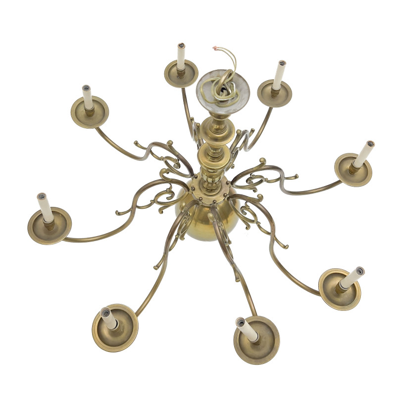An Eight-Light Flemish Style Brass Chandelier